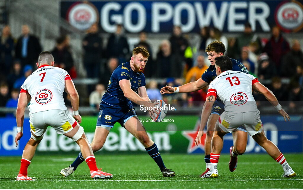 26 September 2025; Aneurin Owen of Dragons in action against Ulster players Nick Timoney, left, and James Hume during the United Rugby Championship match between Ulster and Dragons at Affidea Stadium in Belfast. Photo by Shauna Clinton/Sportsfile