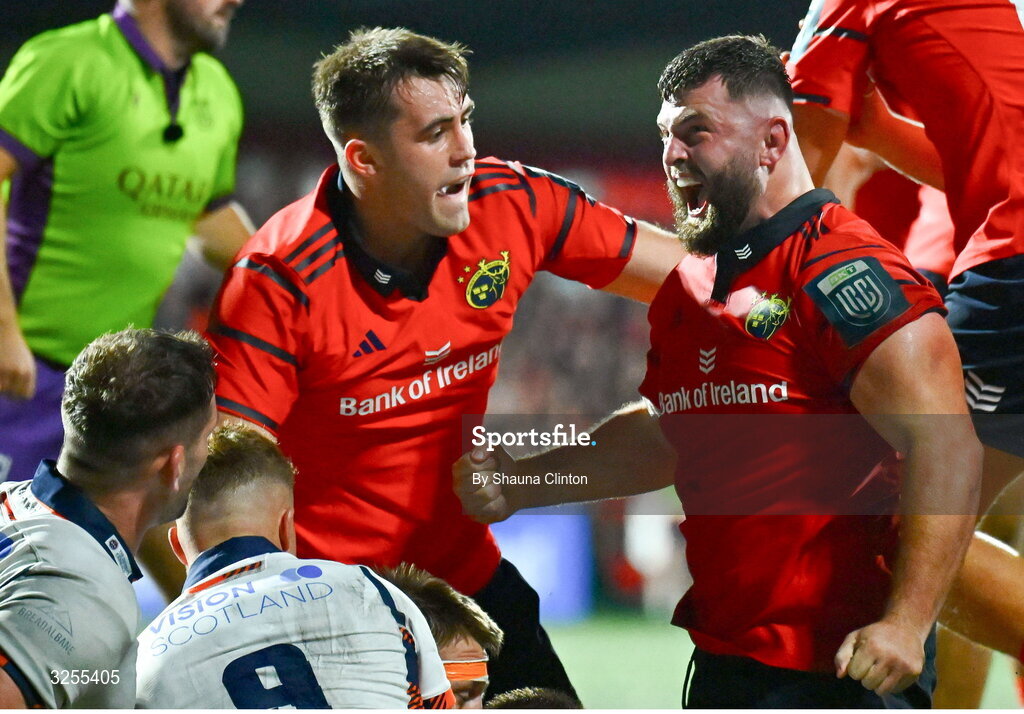10 October 2025; Michael Milne of Munster, centre, celebrates after scoring his side's third try during the United Rugby Championship match between Munster and Edinburgh at Virgin Media Park in Cork. Photo by Shauna Clinton/Sportsfile