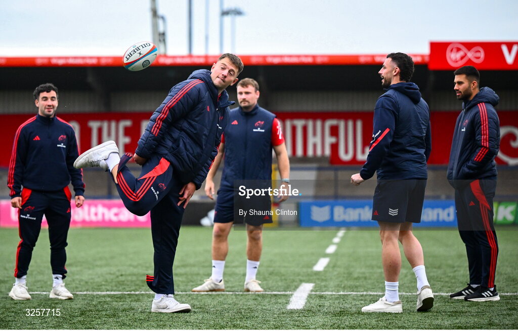 10 October 2025; Lee Barron of Munster, centre, and team-mates inspect the pitch before the United Rugby Championship match between Munster and Edinburgh at Virgin Media Park in Cork. Photo by Shauna Clinton/Sportsfile