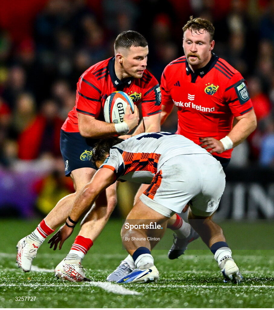 10 October 2025; Calvin Nash of Munster in action against Wes Goosen of Edinburgh during the United Rugby Championship match between Munster and Edinburgh at Virgin Media Park in Cork. Photo by Shauna Clinton/Sportsfile