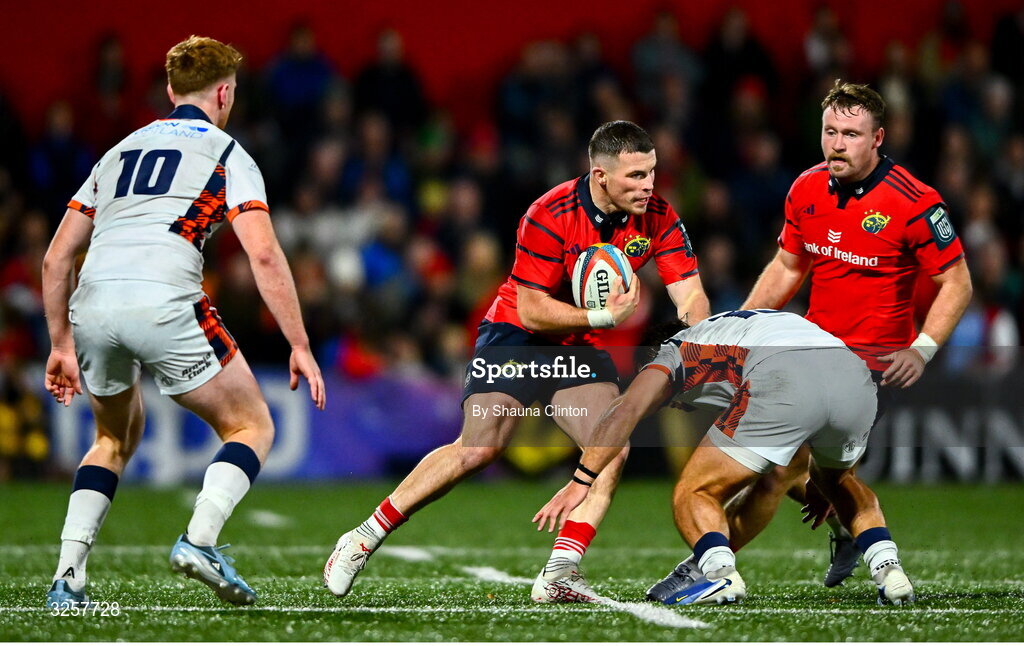 10 October 2025; Calvin Nash of Munster in action against Wes Goosen of Edinburgh during the United Rugby Championship match between Munster and Edinburgh at Virgin Media Park in Cork. Photo by Shauna Clinton/Sportsfile