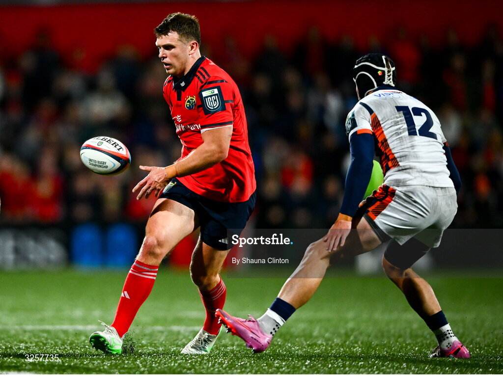 10 October 2025; Tom Farrell of Munster in action against James Lang of Edinburgh during the United Rugby Championship match between Munster and Edinburgh at Virgin Media Park in Cork. Photo by Shauna Clinton/Sportsfile