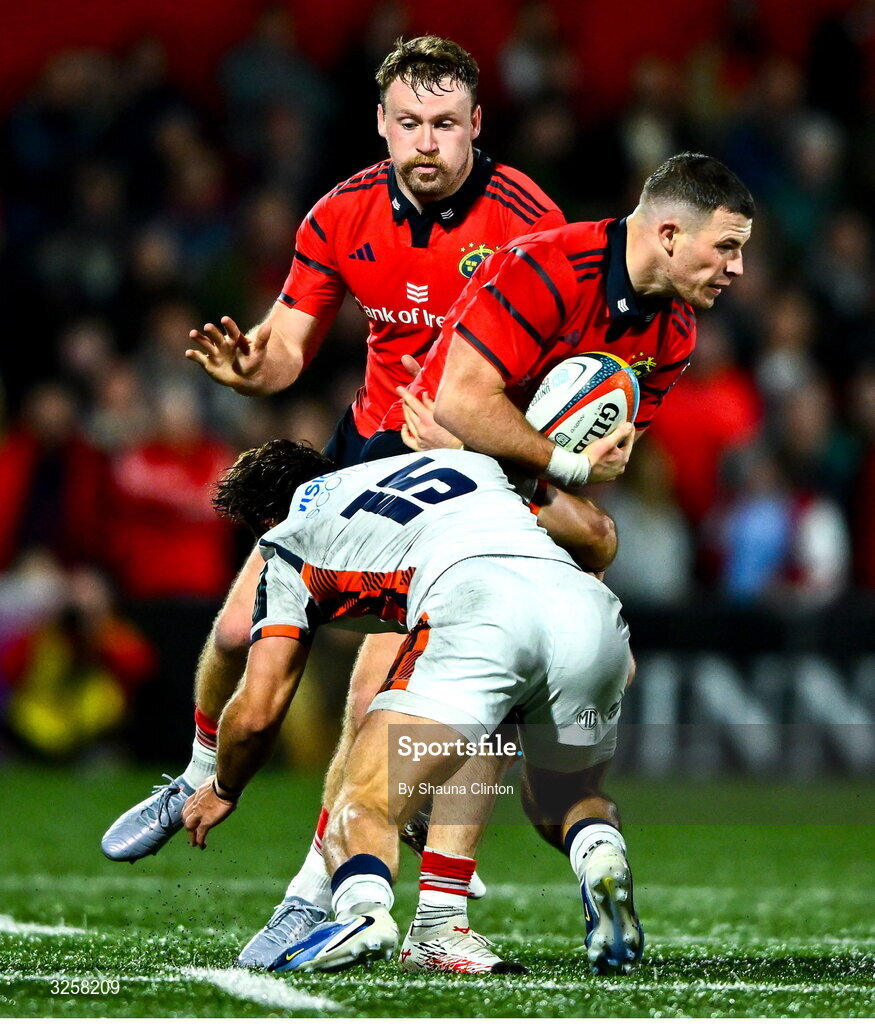 10 October 2025; Calvin Nash of Munster is tackled by Wes Goosen of Edinburgh during the United Rugby Championship match between Munster and Edinburgh at Virgin Media Park in Cork. Photo by Shauna Clinton/Sportsfile