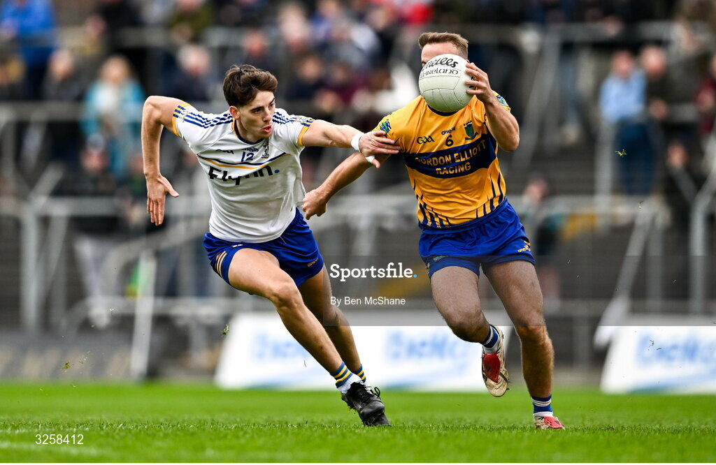 12 October 2025; Ross Ryan of Summerhill is tackled by Daithi McGowan of Ratoath during the Meath County Senior Club Football Championship final match between Ratoath and Summerhill at Páirc Tailteann in Navan, Meath. Photo by Ben McShane/Sportsfile