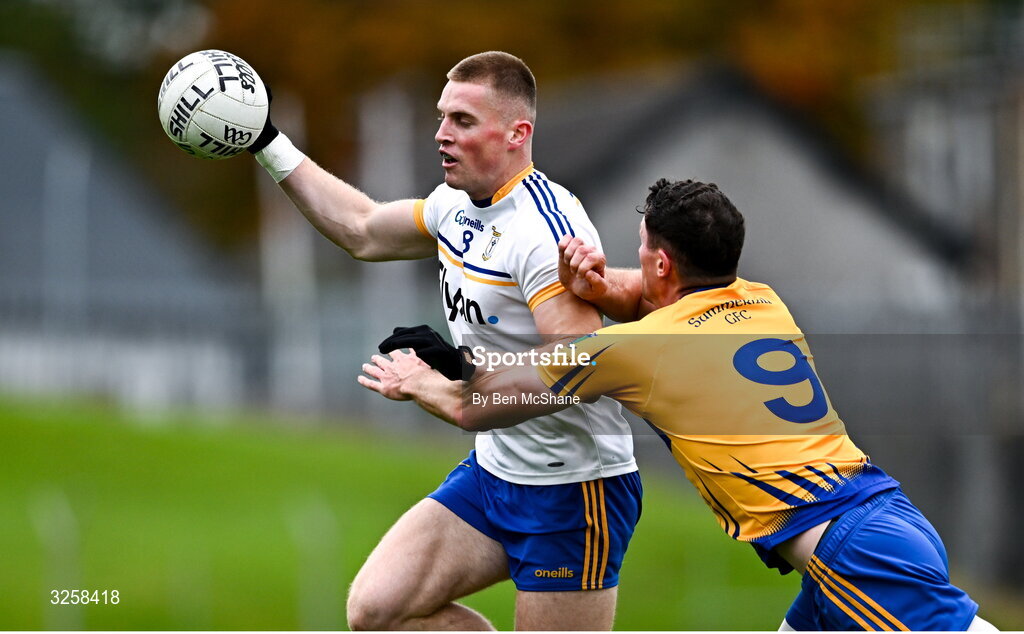 12 October 2025; Jack Flynn of Ratoath is tackled by Adam Flanagan of Summerhill during the Meath County Senior Club Football Championship final match between Ratoath and Summerhill at Páirc Tailteann in Navan, Meath. Photo by Ben McShane/Sportsfile
