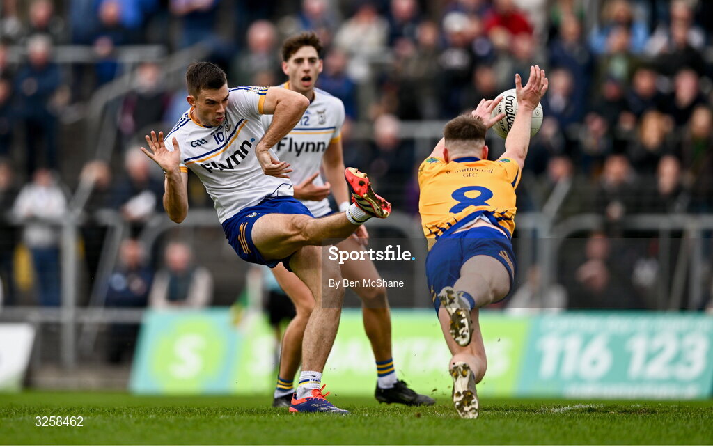 12 October 2025; Cian O'Brien of Ratoath has a shot on goal blocked by Adam McDonnell of Summerhill during the Meath County Senior Club Football Championship final match between Ratoath and Summerhill at Páirc Tailteann in Navan, Meath. Photo by Ben McShane/Sportsfile