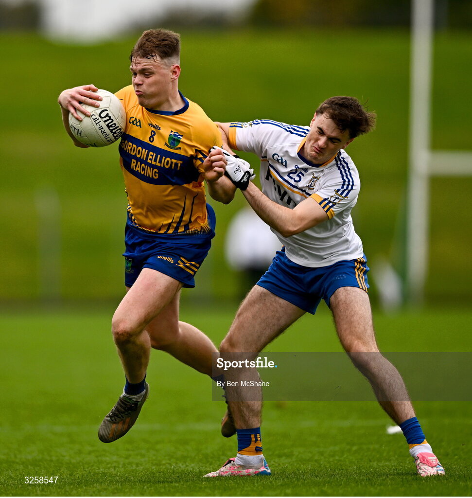 12 October 2025; Adam McDonnell of Summerhill is tackled by Ronan Byrne of Ratoath during the Meath County Senior Club Football Championship final match between Ratoath and Summerhill at Páirc Tailteann in Navan, Meath. Photo by Ben McShane/Sportsfile
