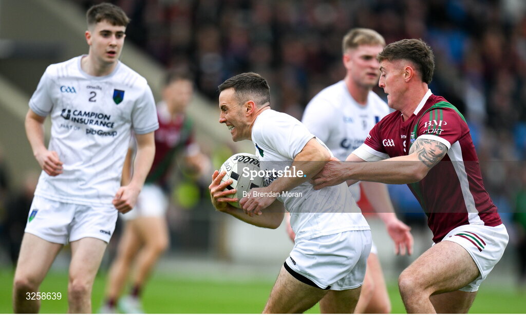 12 October 2025; Niall Donoher of Courtwood in action against Sean Byrne of Portarlington during the Laois County Senior Club Football Championship final match between Courtwood and Portarlington at Laois Hire O'Moore Park in Portlaoise, Laois. Photo by Brendan Moran/Sportsfile