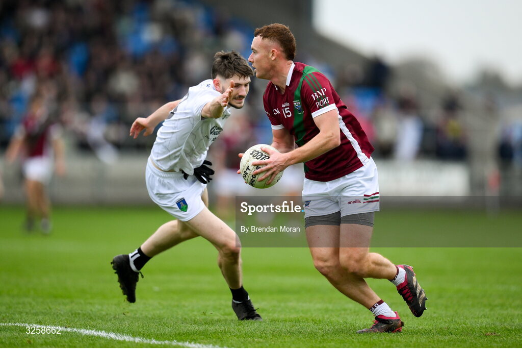 12 October 2025; Jake Foster of Portarlington in action against Daniel Boland of Courtwood during the Laois County Senior Club Football Championship final match between Courtwood and Portarlington at Laois Hire O'Moore Park in Portlaoise, Laois. Photo by Brendan Moran/Sportsfile