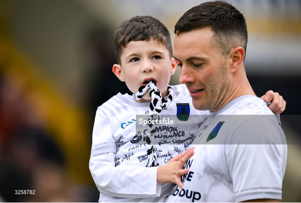12 October 2025; Dan Donoher with his father Niall Donoher of Courtwood during the pre-match parade before the Laois County Senior Club Football Championship final match between Courtwood and Portarlington at Laois Hire O'Moore Park in Portlaoise, Laois. Photo by Brendan Moran/Sportsfile