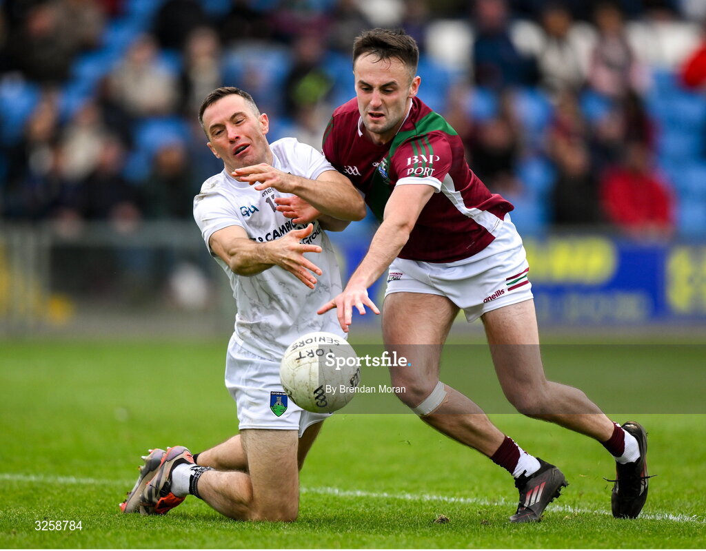 12 October 2025; Niall Donoher of Courtwood is tackled by Mikey Bennett of Portarlington during the Laois County Senior Club Football Championship final match between Courtwood and Portarlington at Laois Hire O'Moore Park in Portlaoise, Laois. Photo by Brendan Moran/Sportsfile