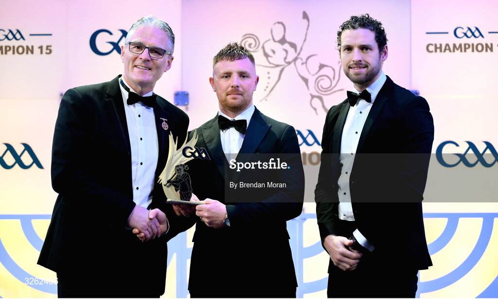 17 October 2025; Roscommon hurler Enda Lawless receives his 2025 Ring, Rackard, and Meagher Team of the Year award from Uachtarán Chumann Lúthchleas Gael Jarlath Burns, left, and GPA Chief Executive Officer Tom Parsons during the GAA Champion 15 Awards ceremony at Croke Park in Dublin. Photo by Brendan Moran/Sportsfile