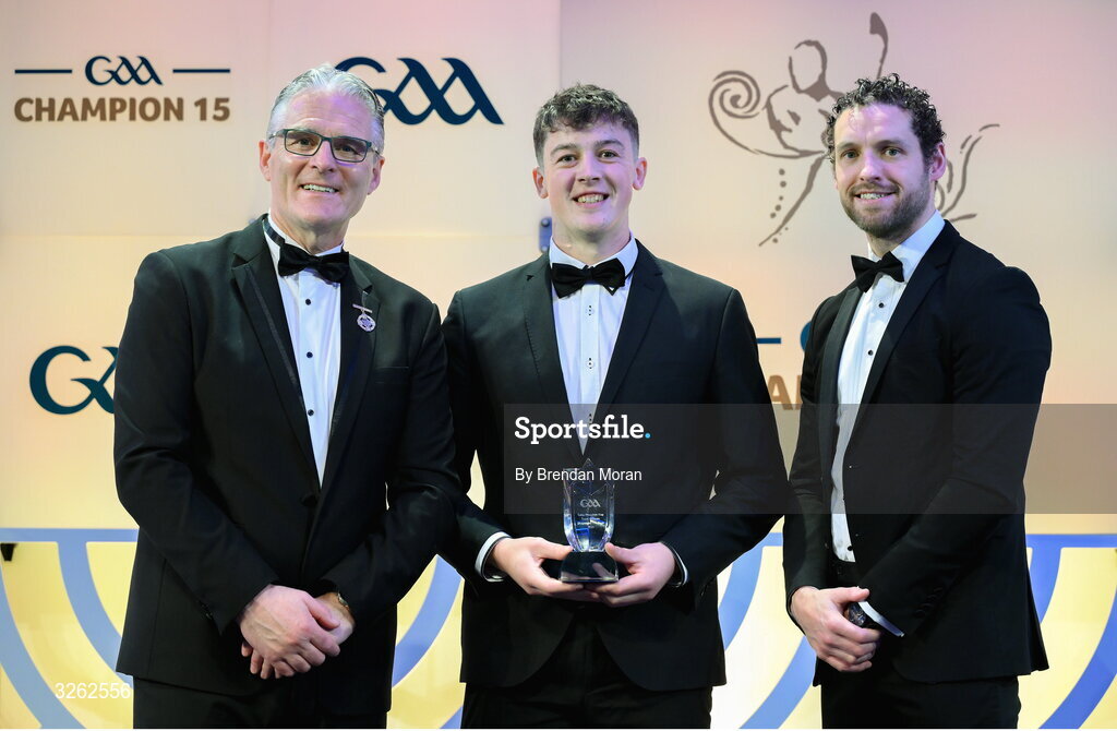 17 October 2025; Lory Meagher Cup Player of the Year Liam O'Brien of Cavan is presented with his award by Uachtarán Chumann Lúthchleas Gael Jarlath Burns, left, and GPA Chief Executive Officer Tom Parsons, right, during the GAA Champion 15 Awards ceremony at Croke Park in Dublin. Photo by Brendan Moran/Sportsfile