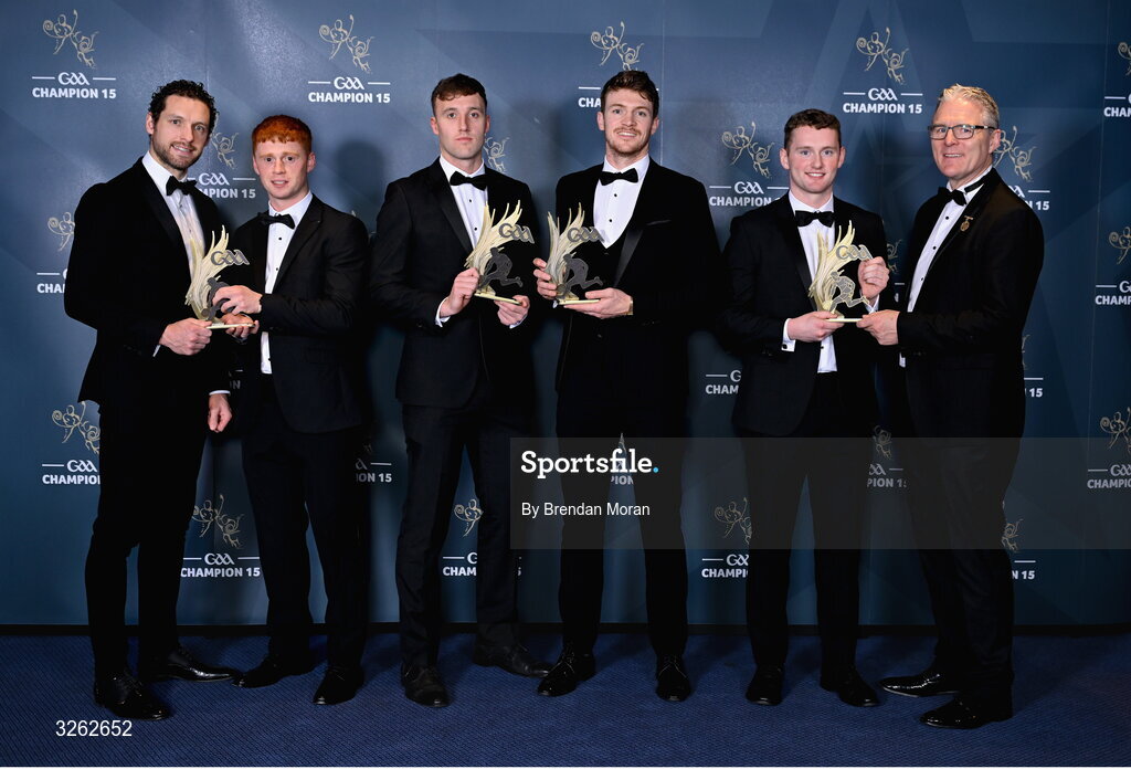 17 October 2025; GPA Chief Executive Officer Tom Parsons, left, and Uachtarán Chumann Lúthchleas Gael Jarlath Burns, right, present Kildare footballers, from left, Harry O'Neill, Darragh Kirwan, Kevin Feely and James McGrath with their Tailteann Cup of the Year Awards during the GAA Champion 15 Awards ceremony at Croke Park in Dublin. Photo by Brendan Moran/Sportsfile