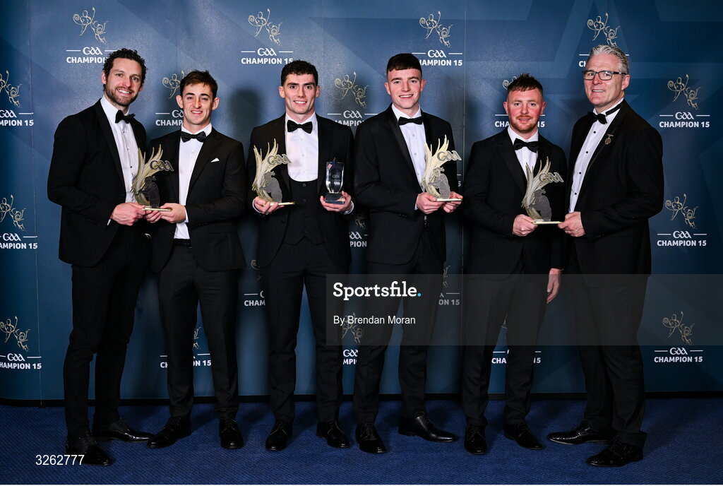 17 October 2025; Roscommon hurlers, from second from left; Mark Ward, Conor Cosgrove, Sean Canning and Enda Lawless are presented with their 2025 Ring, Rackard, and Meagher Team of the Year awards by GPA Chief Executive Officer Tom Parsons, left, and Uachtarán Chumann Lúthchleas Gael Jarlath Burns, right, during the GAA Champion 15 Awards ceremony at Croke Park in Dublin. Photo by Brendan Moran/Sportsfile