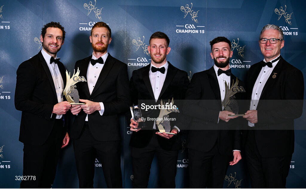 17 October 2025; London hurlers, from second from left; Conor Byrne, Sean Glynn and Enda Egan are presented with their 2025 Ring, Rackard, and Meagher Team of the Year awards by GPA Chief Executive Officer Tom Parsons, left, and Uachtarán Chumann Lúthchleas Gael Jarlath Burns, right, during the GAA Champion 15 Awards ceremony at Croke Park in Dublin. Photo by Brendan Moran/Sportsfile
