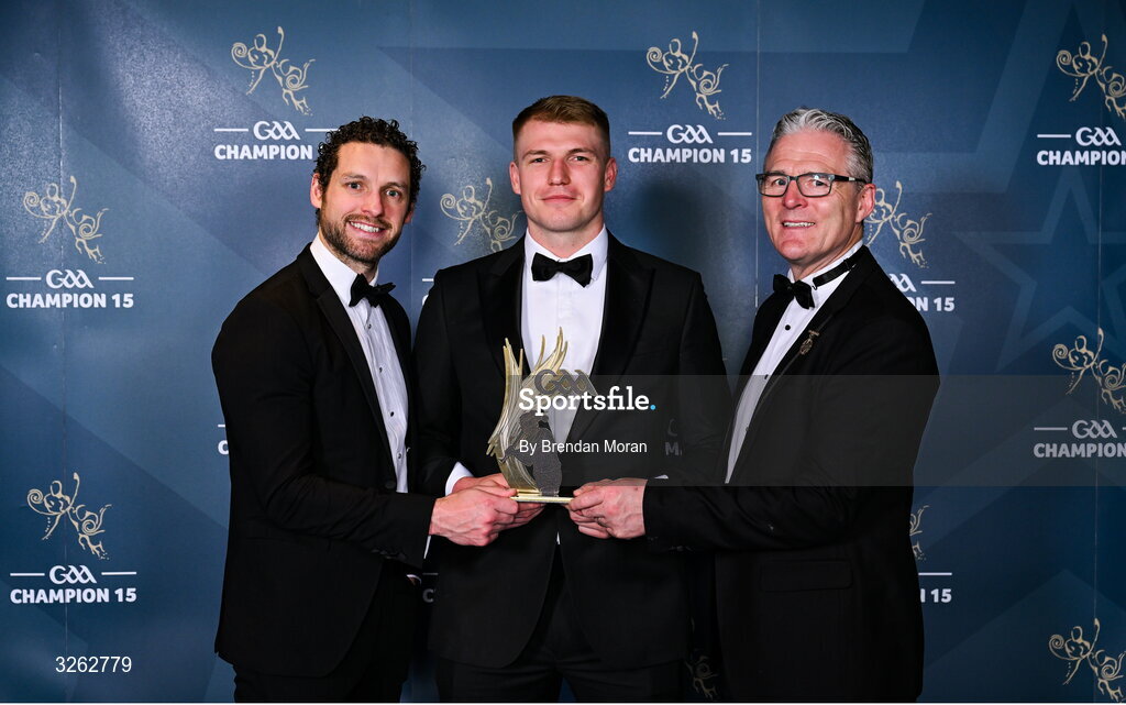 17 October 2025; Wicklow hurler Pádraig Doyle is presented with his 2025 Ring, Rackard, and Meagher Team of the Year award by GPA Chief Executive Officer Tom Parsons, left, and Uachtarán Chumann Lúthchleas Gael Jarlath Burns, right, during the GAA Champion 15 Awards ceremony at Croke Park in Dublin. Photo by Brendan Moran/Sportsfile
