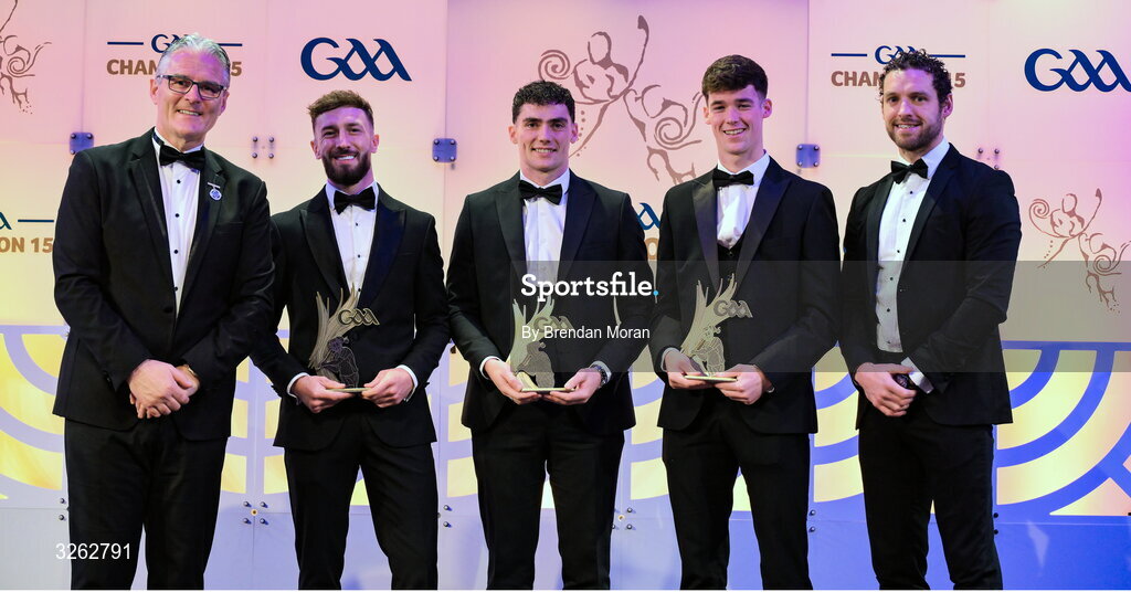 17 October 2025; Uachtarán Chumann Lúthchleas Gael Jarlath Burns, left, and GPA Chief Executive Officer Tom Parsons, right, present London hurler Enda Egan, second from left, Roscommon hurler Conor Cosgrove and Derry hurler Ruairí Ó Mianáin with their 2025 Ring, Rackard, and Meagher Team of the Year awards during the GAA Champion 15 Awards ceremony at Croke Park in Dublin. Photo by Brendan Moran/Sportsfile