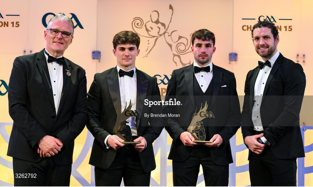 17 October 2025; Uachtarán Chumann Lúthchleas Gael Jarlath Burns, left, and GPA Chief Executive Officer Tom Parsons, right, present Derry hurler Eamon Conway, second from left, and Mayo hurler Daniel Huane with their 2025 Ring, Rackard, and Meagher Team of the Year awards during the GAA Champion 15 Awards ceremony at Croke Park in Dublin. Photo by Brendan Moran/Sportsfile