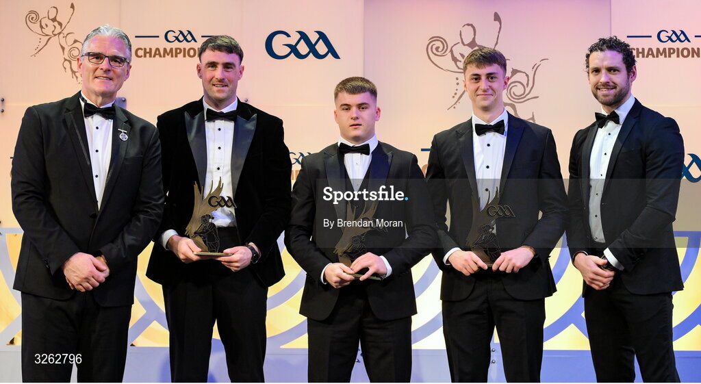 17 October 2025; Uachtarán Chumann Lúthchleas Gael Jarlath Burns, left, and GPA Chief Executive Officer Tom Parsons, right, present Laois hurler Paddy Purcell, Laois hurler Tomás Keyes and Kildare hurler David Qualter with their 2025 Joe McDonagh Team of the Year awards during the GAA Champion 15 Awards ceremony at Croke Park in Dublin. Photo by Brendan Moran/Sportsfile