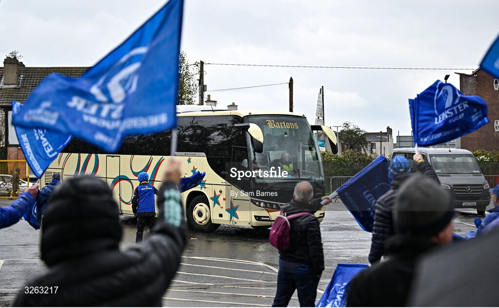 18 October 2025; Leinster supporters wave flags as the team bus arrives before the United Rugby Championship match between Leinster and Munster at Croke Park in Dublin. Photo by Sam Barnes/Sportsfile