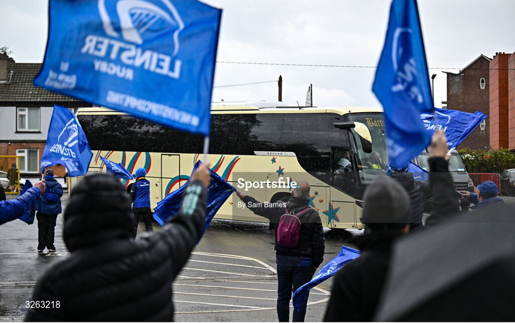 18 October 2025; Leinster supporters wave flags as the team bus arrives before the United Rugby Championship match between Leinster and Munster at Croke Park in Dublin. Photo by Sam Barnes/Sportsfile