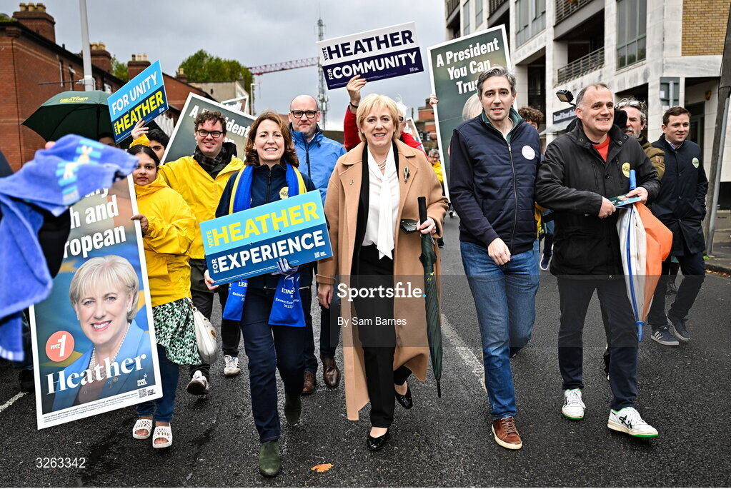 18 October 2025; Fine Gael presidential candidate Heather Humphreys, centre, and Tánaiste Simon Harris TD, second from right, before the United Rugby Championship match between Leinster and Munster at Croke Park in Dublin. Photo by Sam Barnes/Sportsfile