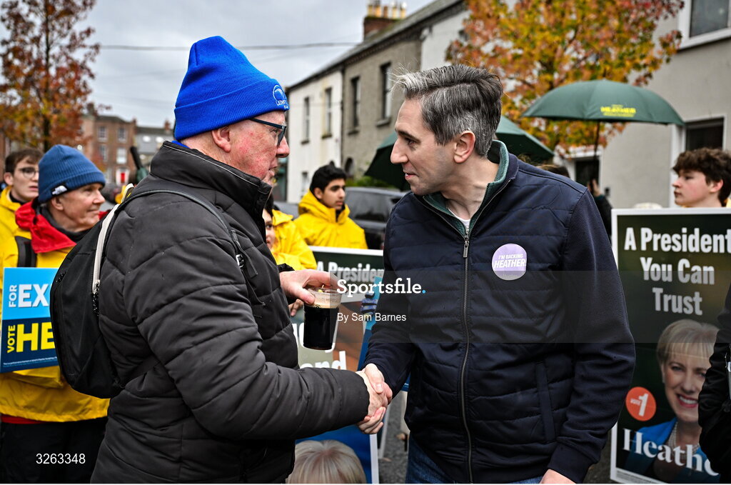 18 October 2025; Tánaiste Simon Harris TD, with a Leinster supporter before the United Rugby Championship match between Leinster and Munster at Croke Park in Dublin. Photo by Sam Barnes/Sportsfile