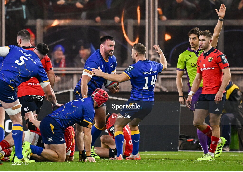 18 October 2025; Rónan Kelleher of Leinster, left, celebrates with teammate Jordan Larmour after scoring their side's first try during the United Rugby Championship match between Leinster and Munster at Croke Park in Dublin. Photo by Seb Daly/Sportsfile