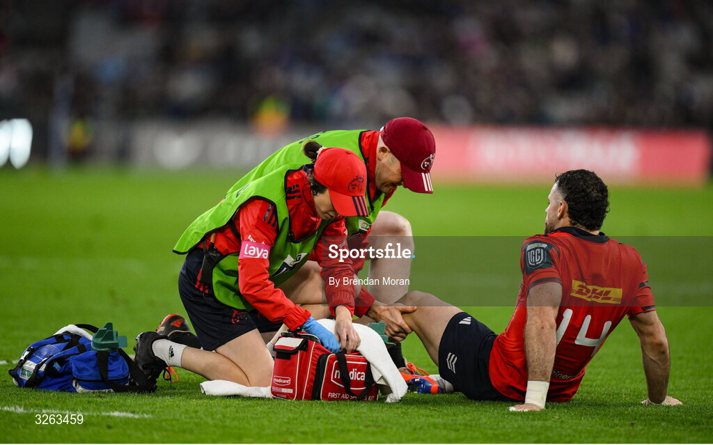 18 October 2025; Andrew Smith of Munster recieves medical attention during the United Rugby Championship match between Leinster and Munster at Croke Park in Dublin. Photo by Brendan Moran/Sportsfile