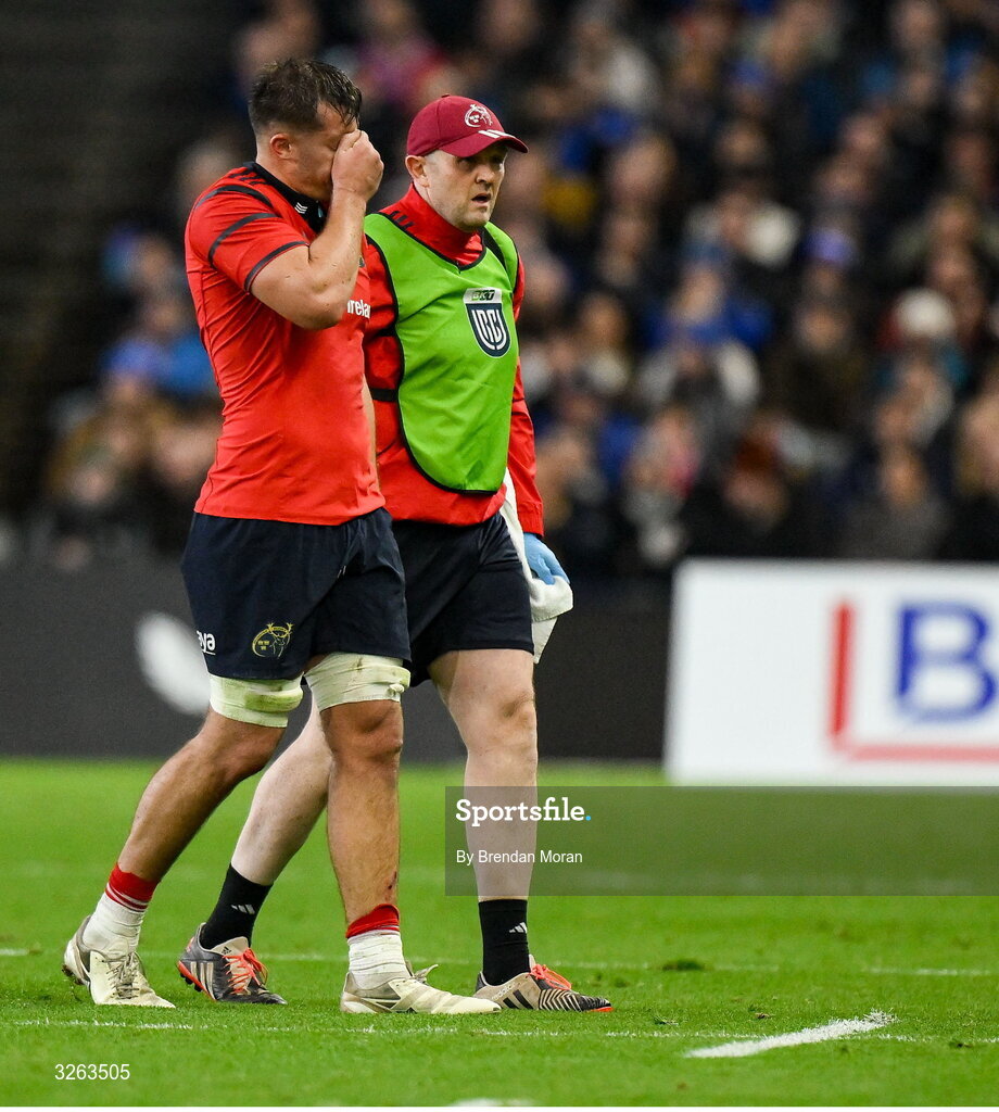 18 October 2025; Brian Gleeson of Munster leaves the pitch with an injury during the United Rugby Championship match between Leinster and Munster at Croke Park in Dublin. Photo by Brendan Moran/Sportsfile