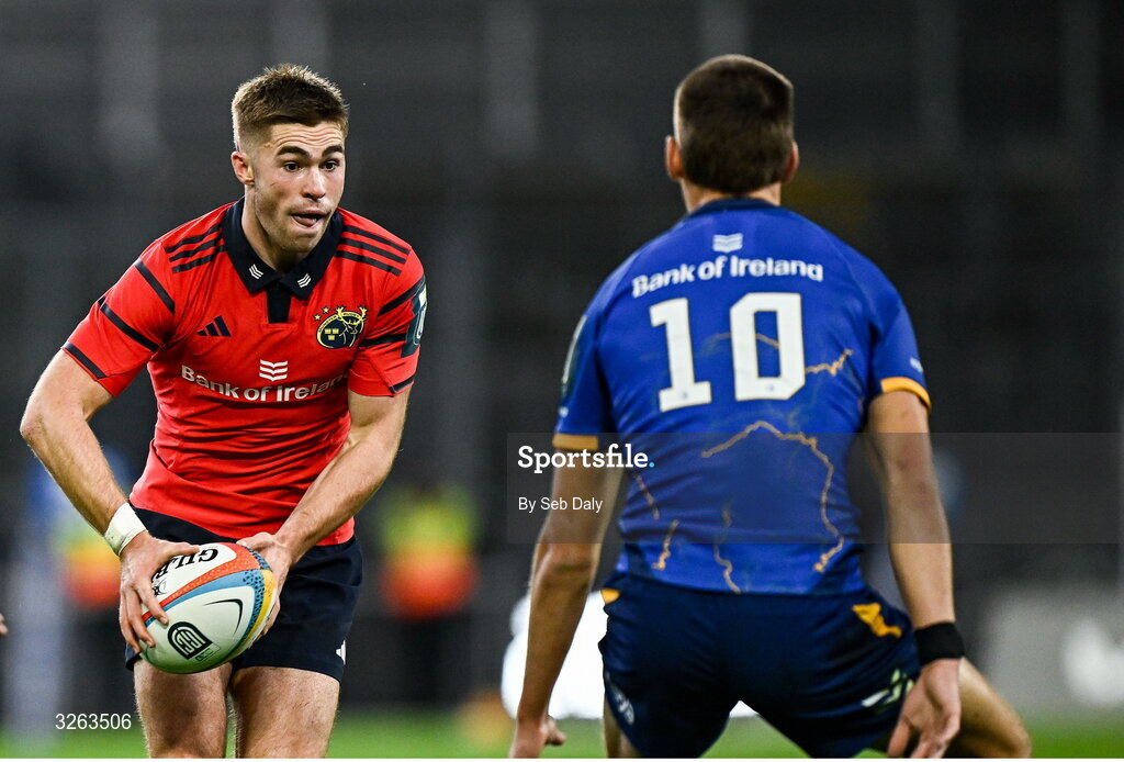 18 October 2025; Jack Crowley of Munster in action against Sam Prendergast of Leinster during the United Rugby Championship match between Leinster and Munster at Croke Park in Dublin. Photo by Seb Daly/Sportsfile