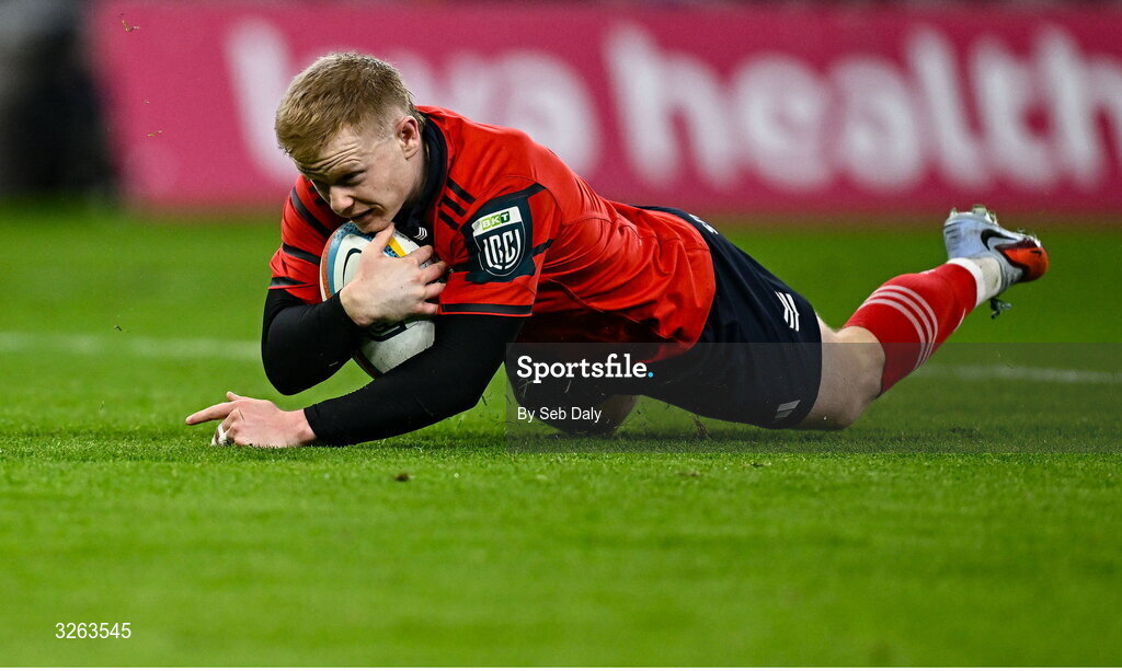 18 October 2025; Ethan Coughlan of Munster scores his side's third try during the United Rugby Championship match between Leinster and Munster at Croke Park in Dublin. Photo by Seb Daly/Sportsfile