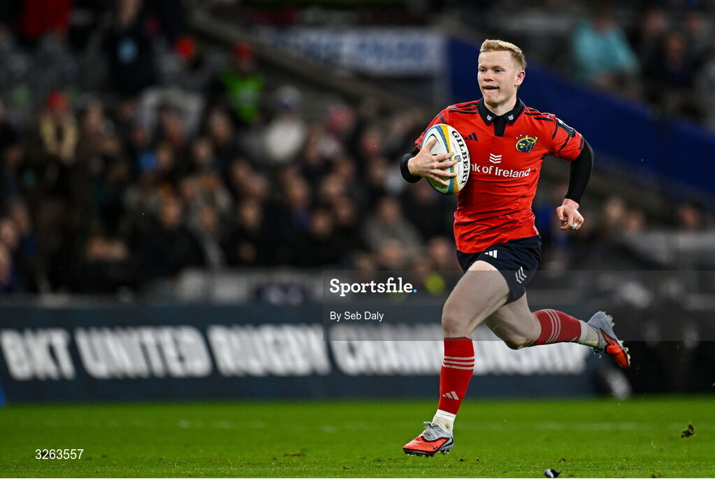 18 October 2025; Ethan Coughlan of Munster on his way to scoring his side's third try during the United Rugby Championship match between Leinster and Munster at Croke Park in Dublin. Photo by Seb Daly/Sportsfile