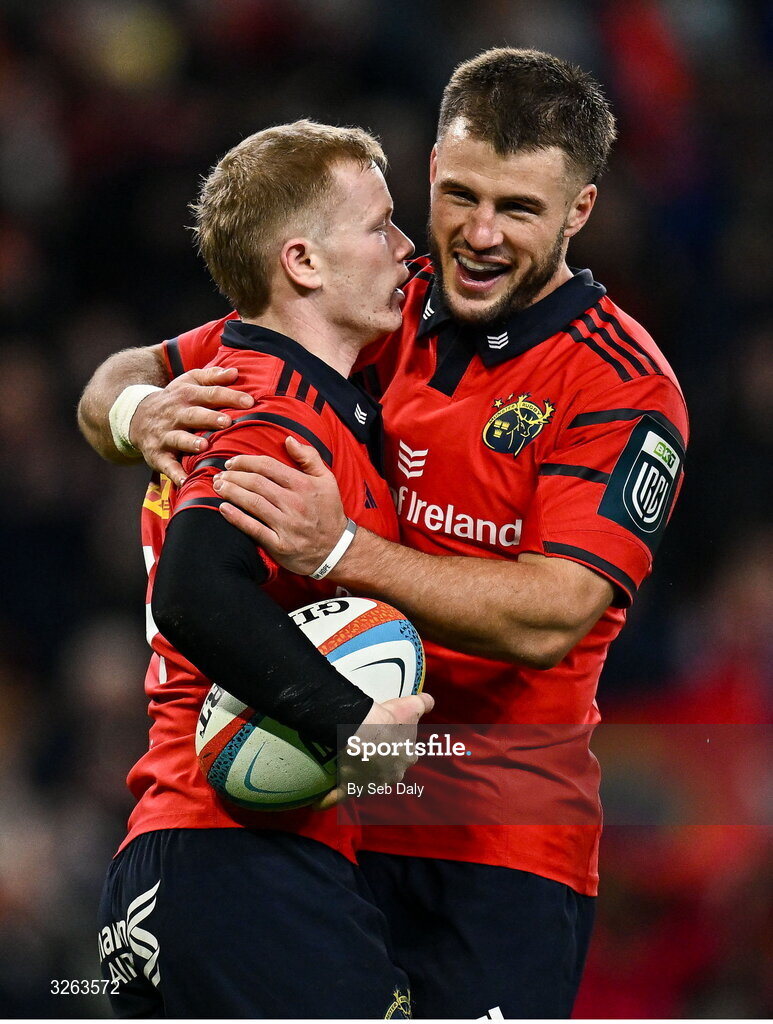 18 October 2025; Ethan Coughlan of Munster, left, celebrates with teammate Alex Nankivell after scoring their side's third try during the United Rugby Championship match between Leinster and Munster at Croke Park in Dublin. Photo by Seb Daly/Sportsfile