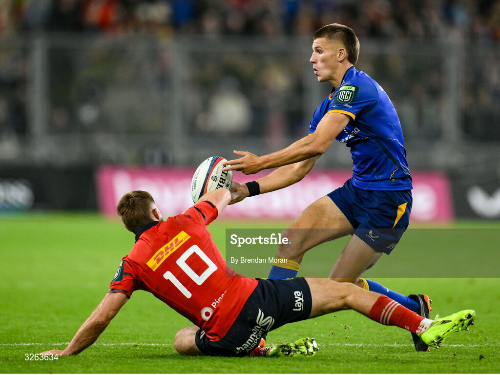 18 October 2025; Sam Prendergast of Leinster in action against Jack Crowley of Munster during the United Rugby Championship match between Leinster and Munster at Croke Park in Dublin. Photo by Brendan Moran/Sportsfile