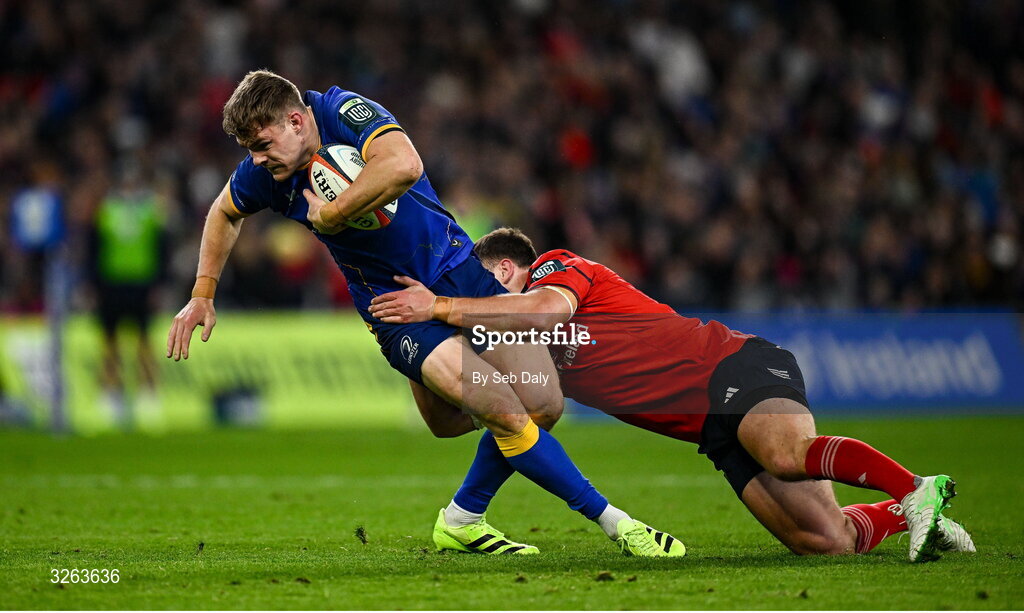 18 October 2025; Garry Ringrose of Leinster is tackled by Tom Farrell of Munster during the United Rugby Championship match between Leinster and Munster at Croke Park in Dublin. Photo by Seb Daly/Sportsfile