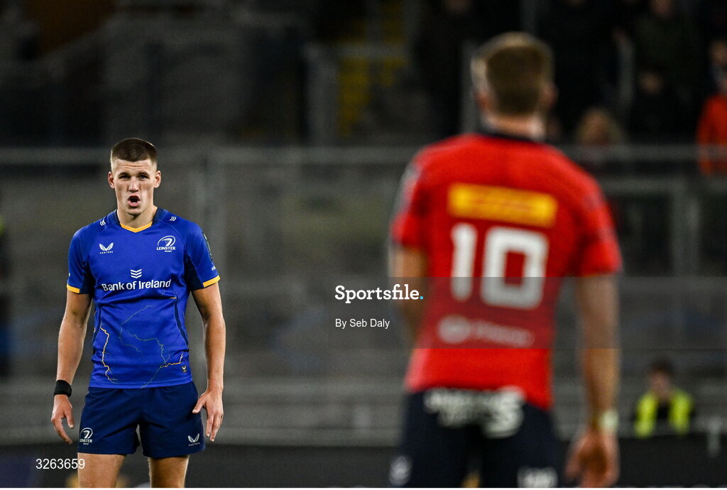 18 October 2025; Sam Prendergast of Leinster and Jack Crowley of Munster during the United Rugby Championship match between Leinster and Munster at Croke Park in Dublin. Photo by Seb Daly/Sportsfile