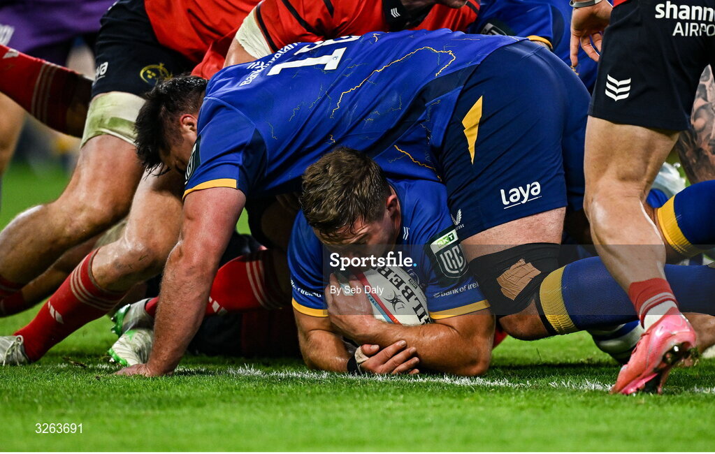 18 October 2025; Scott Penny of Leinster dives over to score his side's second try during the United Rugby Championship match between Leinster and Munster at Croke Park in Dublin. Photo by Seb Daly/Sportsfile