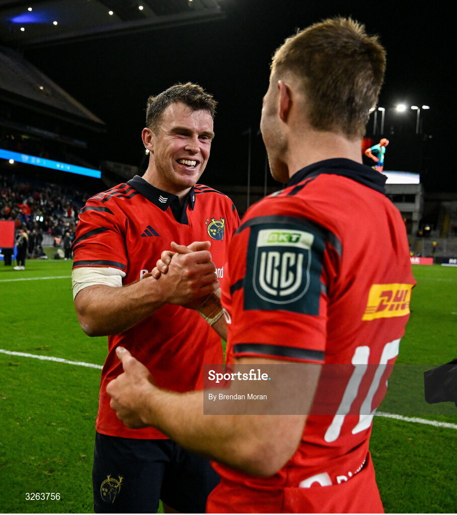 18 October 2025; Tom Farrell, left, and Jack Crowley of Munster celebrate after the United Rugby Championship match between Leinster and Munster at Croke Park in Dublin. Photo by Brendan Moran/Sportsfile