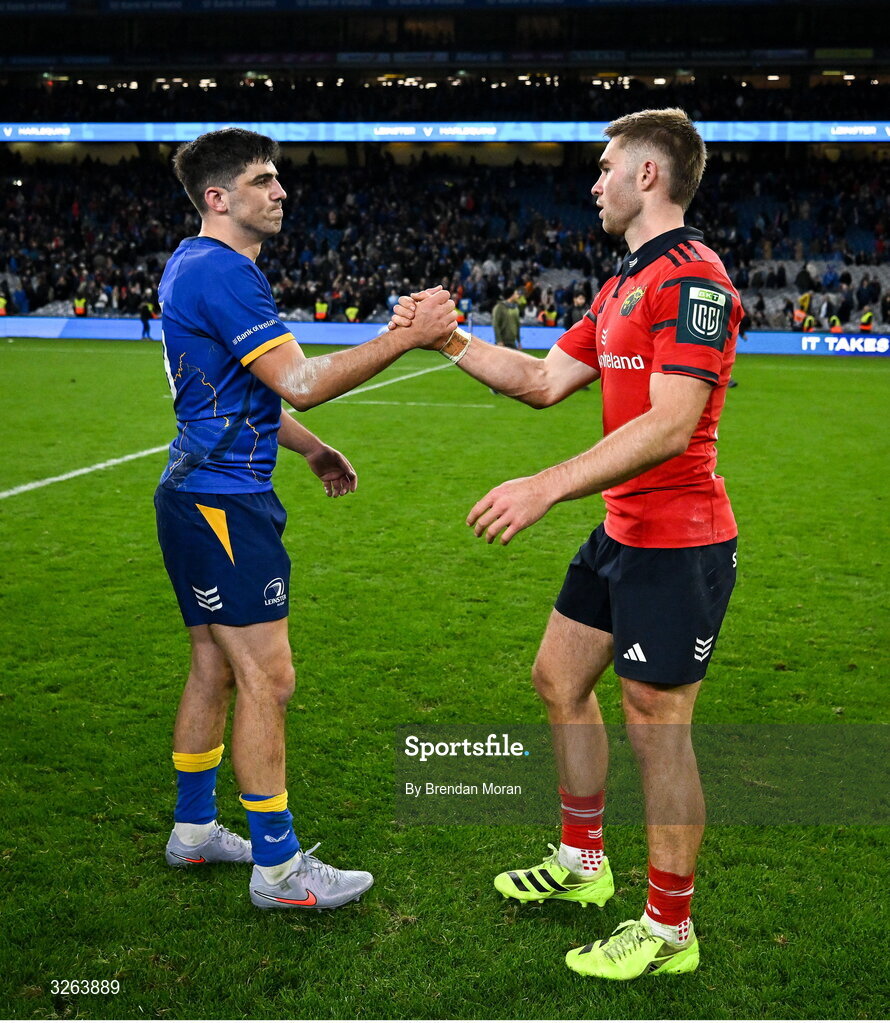 18 October 2025; Jimmy O'Brien of Leinster, left, and Jack Crowley of Munster after the United Rugby Championship match between Leinster and Munster at Croke Park in Dublin. Photo by Brendan Moran/Sportsfile