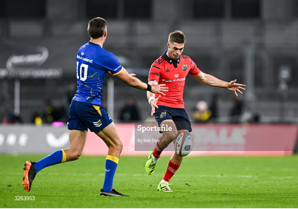 18 October 2025; Jack Crowley of Munster and Sam Prendergast of Leinster during the United Rugby Championship match between Leinster and Munster at Croke Park in Dublin. Photo by Seb Daly/Sportsfile