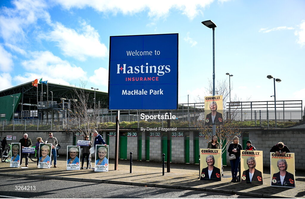 19 October 2025; Picketers for opposing Presidential candidates Heather Humphreys and Catherine Connolly are seen outside the ground before the Mayo County Senior Club Football Championship final match between Ballina Stephenites and Westport at Hastings Insurance MacHale Park in Castlebar, Mayo. Photo by David Fitzgerald/Sportsfile