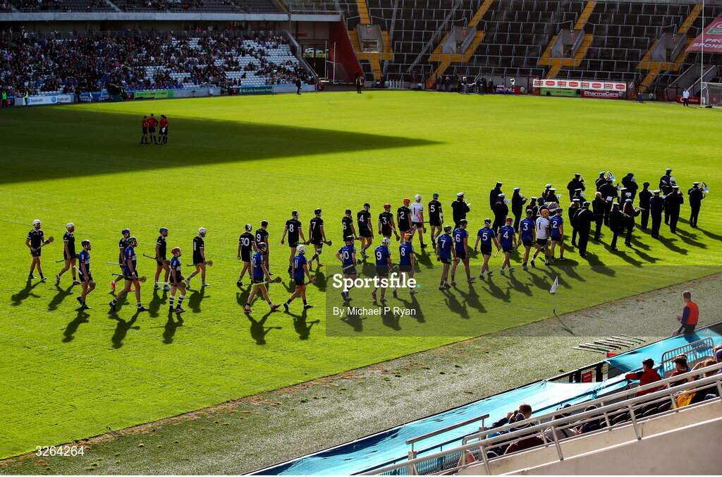 19 October 2025; Players from both teams line up behind the band for the parade during the Cork County Senior Club Hurling Championship final match between Sarsfields and Midleton at SuperValu Páirc Uí Chaoimh in Cork. Photo by Michael P Ryan/Sportsfile