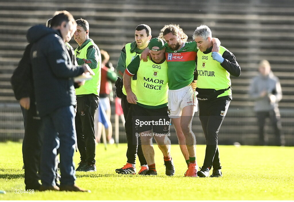 19 October 2025; Padraig O'Hora of Ballina Stephenites is helped off after sustaining an injury during the Mayo County Senior Club Football Championship final match between Ballina Stephenites and Westport at Hastings Insurance MacHale Park in Castlebar, Mayo. Photo by David Fitzgerald/Sportsfile