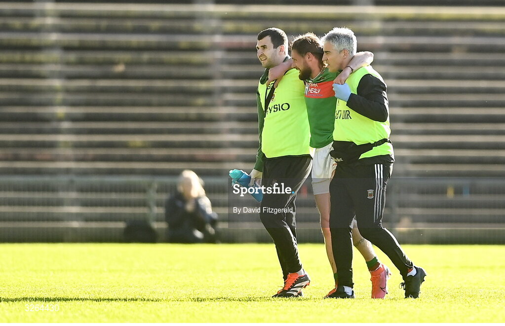 19 October 2025; Padraig O'Hora of Ballina Stephenites is helped off after sustaining an injury during the Mayo County Senior Club Football Championship final match between Ballina Stephenites and Westport at Hastings Insurance MacHale Park in Castlebar, Mayo. Photo by David Fitzgerald/Sportsfile