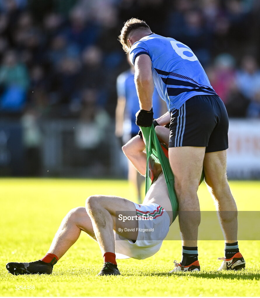 19 October 2025; Eoghan McLaughlin of Westport picks up David Tighe of Ballina Stephenites during the Mayo County Senior Club Football Championship final match between Ballina Stephenites and Westport at Hastings Insurance MacHale Park in Castlebar, Mayo. Photo by David Fitzgerald/Sportsfile