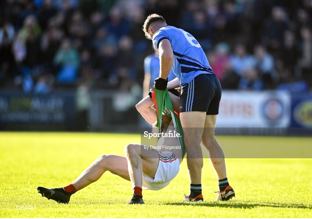 19 October 2025; Eoghan McLaughlin of Westport picks up David Tighe of Ballina Stephenites during the Mayo County Senior Club Football Championship final match between Ballina Stephenites and Westport at Hastings Insurance MacHale Park in Castlebar, Mayo. Photo by David Fitzgerald/Sportsfile