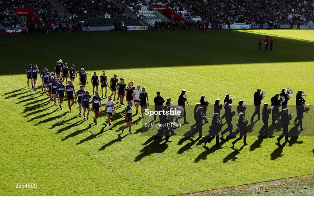 19 October 2025; Players from both teams line up behind the band for the parade during the Cork County Senior Club Hurling Championship final match between Sarsfields and Midleton at SuperValu Páirc Uí Chaoimh in Cork. Photo by Michael P Ryan/Sportsfile