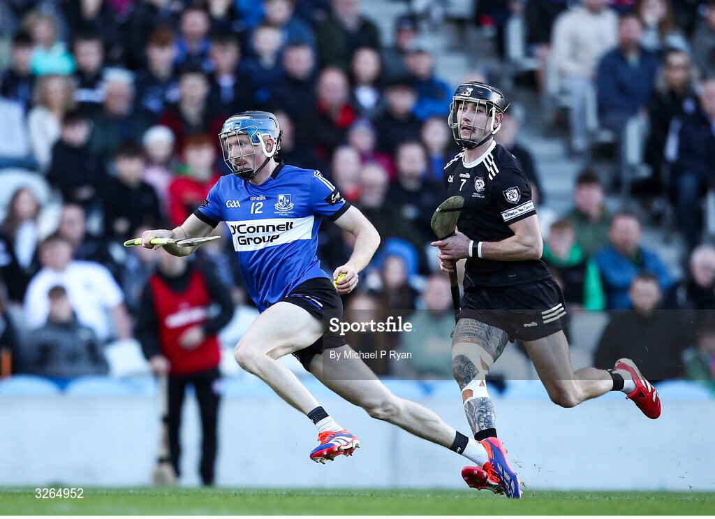 19 October 2025; Cian Darcy of Sarsfields in action against Ross O'Regan of Midleton during the Cork County Senior Club Hurling Championship final match between Sarsfields and Midleton at SuperValu Páirc Uí Chaoimh in Cork. Photo by Michael P Ryan/Sportsfile